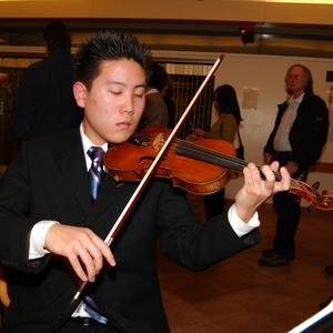 Violinist Performing at the State of the County Luncheon